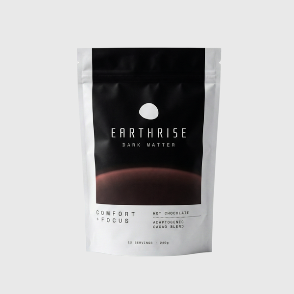 Earthrise Dark Matter hot chocolate package on a light gray background